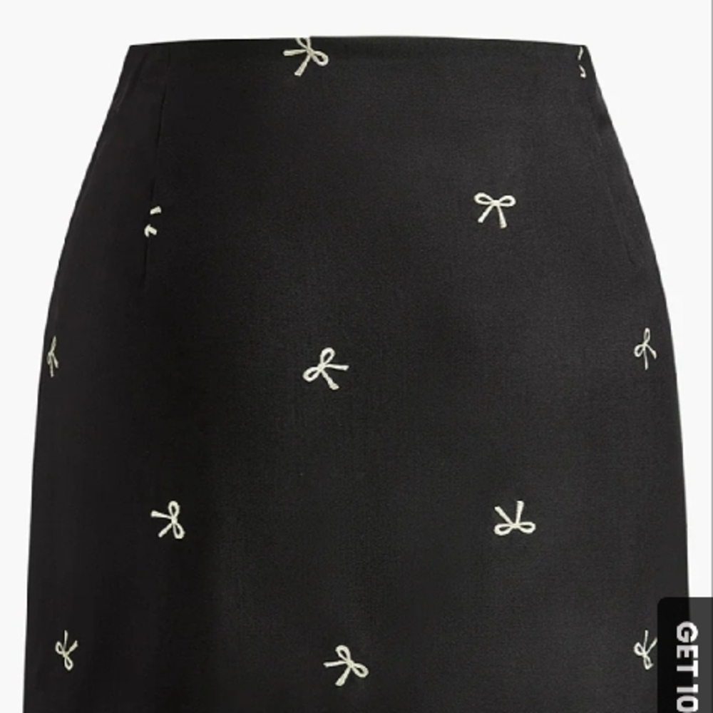 Elegant Black Skirt with White Bow Accents